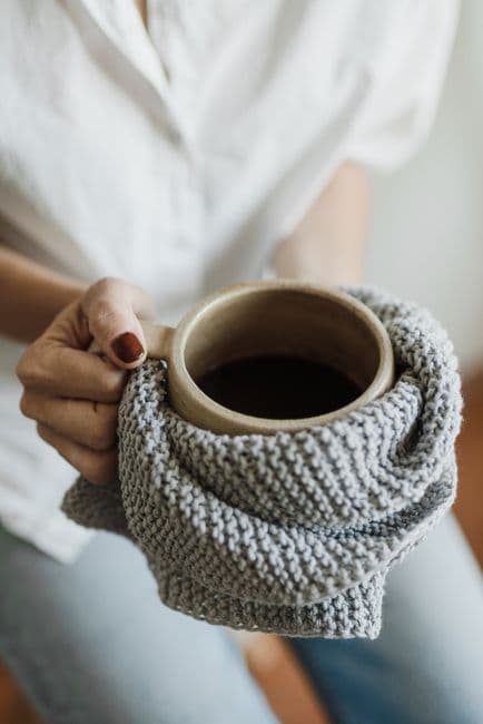 A cup held in two hands