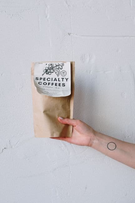 A 250 g bag held against white
